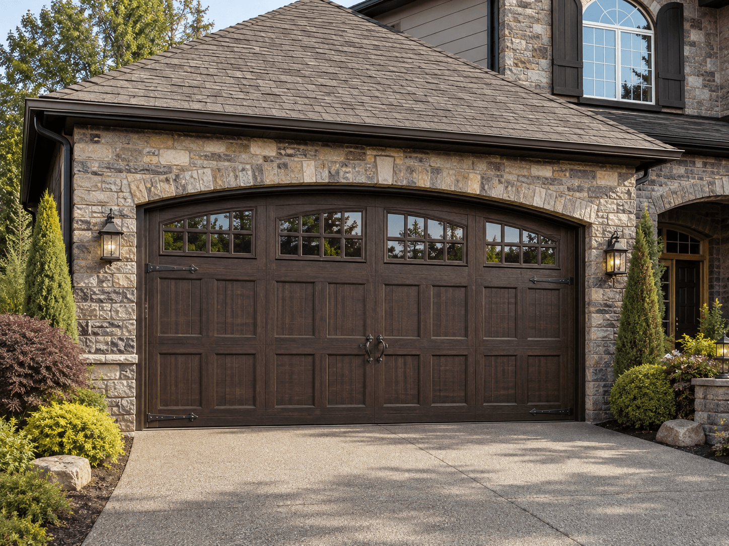 Amarr Biltmore Collection garage door — premium carriage house style