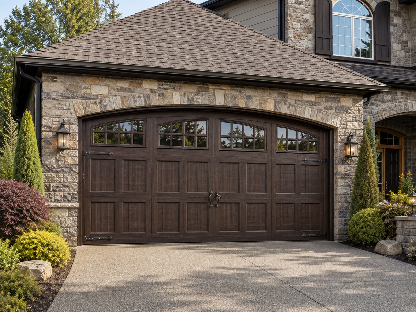 Amarr Biltmore Collection garage door — premium carriage house style